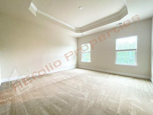 Building Photo - Beautiful 3 Story 3 Bedroom Townhouse with Huge 1st Floor Flex Space with Access to Patio + 2 Car...