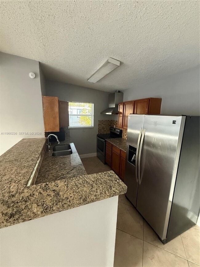 Building Photo - 4120 NE 12th Terrace