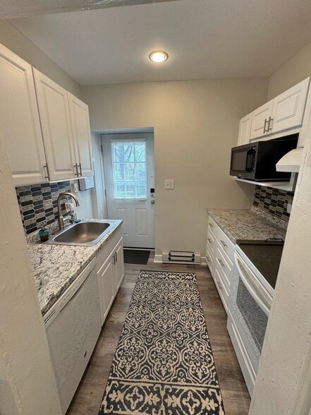Kitchen with DW and Microwave - 130 E Wayne Ave