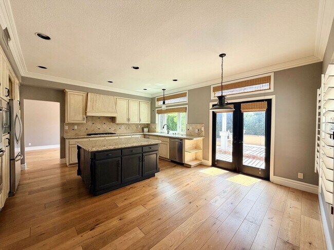 Building Photo - Elegant Mediterranean Living with Private Pergola Garden & Resort Amenities
