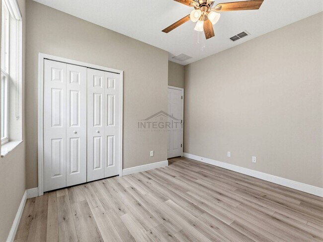 Building Photo - 8947 Garden Party Dr