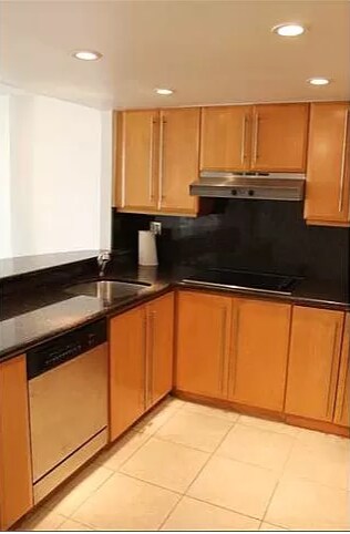 Kitchen with open design to living room - 600 NE 36th St