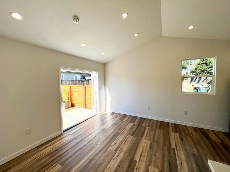Living Space Looking outside with french doors - 166 Comstock Dr
