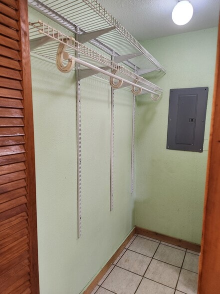 Walk in closet off of primary bedroom - 5212 Bertsville Rd