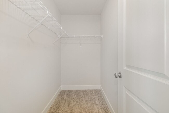 Building Photo - Modern 2025 Townhome | Open-Concept Living, Chef’s Kitchen with Large Island & 2-Car Garage