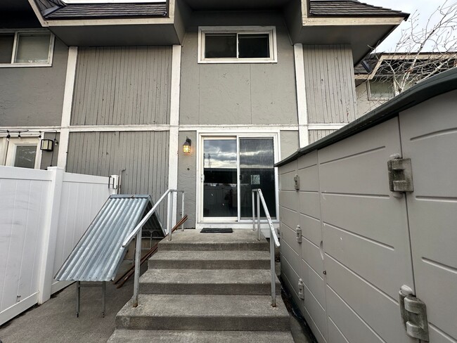 Building Photo - Spacious, three level, 4 Bed 2.5 bath Townhome in Ammon right behind the Walmart on Hitt.