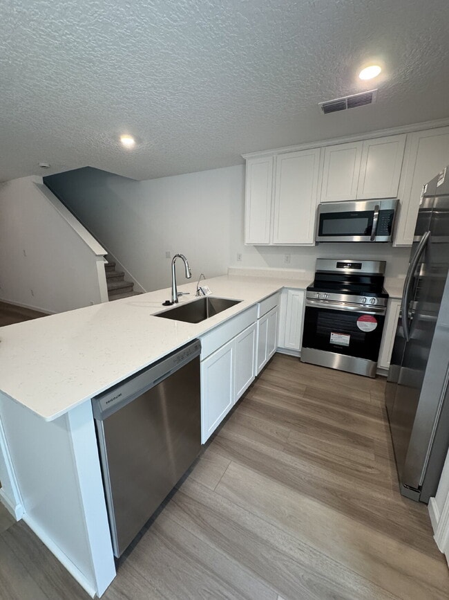 Building Photo - Brand New 3 Bed | 2.5 Bath Townhome – Mode...