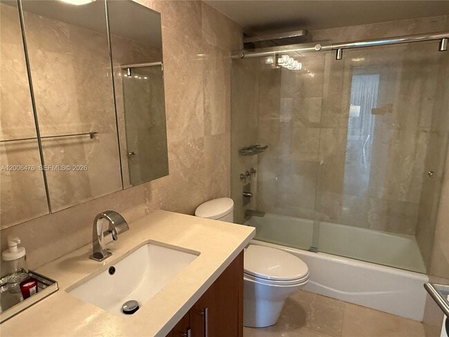 Building Photo - 10275 Collins Ave