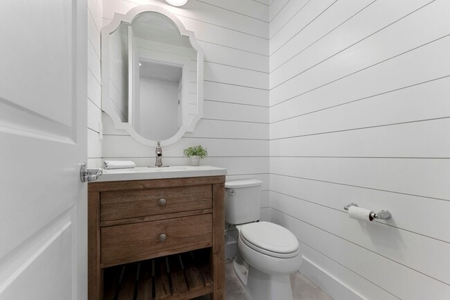 Building Photo - Introducing a captivating 3-story townhome...