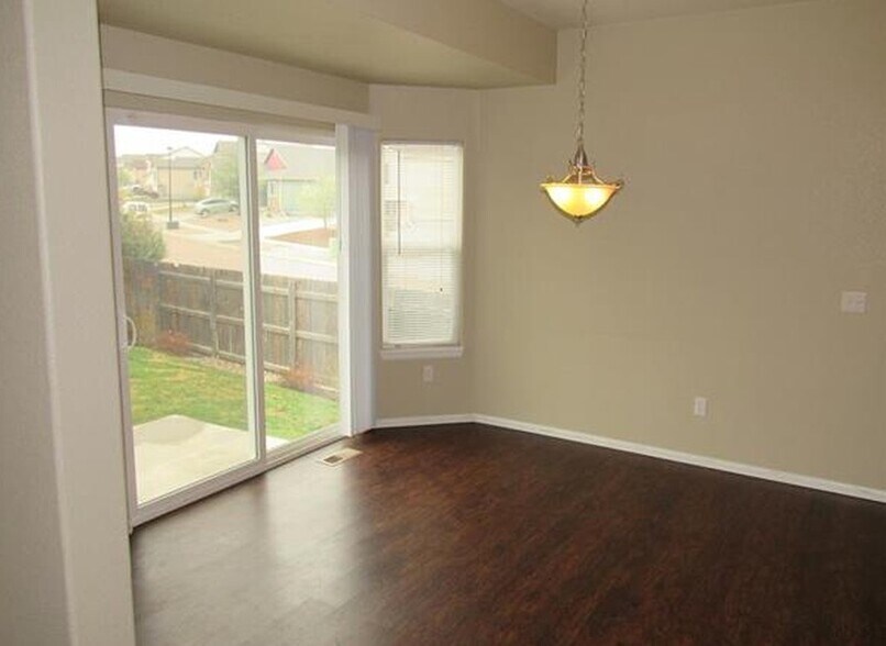 Dining room leading out to backyard. - 7334 Pearly Heath Rd