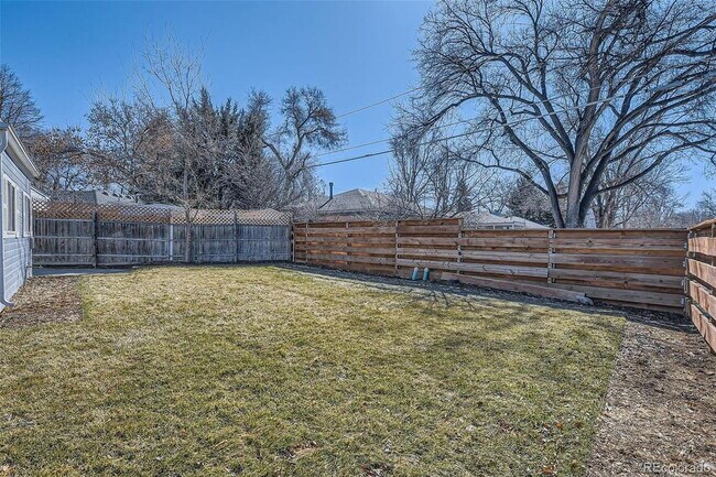 Building Photo - "Charming 3-Bed SFH Denver Gem with Gleaming Hardwood Floors"