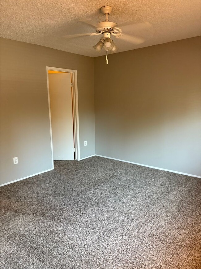 Building Photo - Updated Two Bedroom, 1.5 Bath Condo w/Fire...