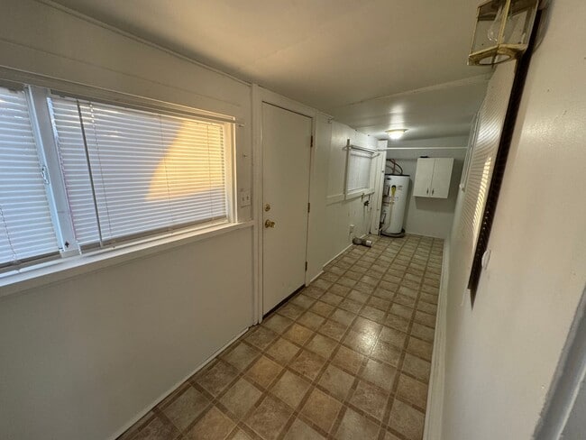 Building Photo - House with garage, carport, yard, & shed