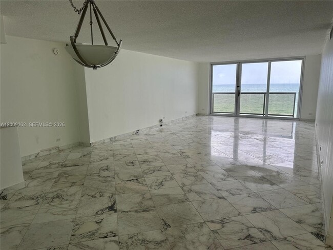Building Photo - 6039 Collins Ave