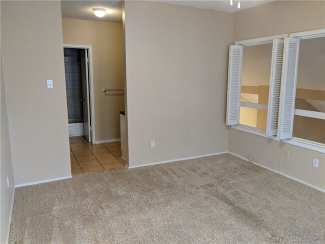 Building Photo - 5981 Arapaho Rd