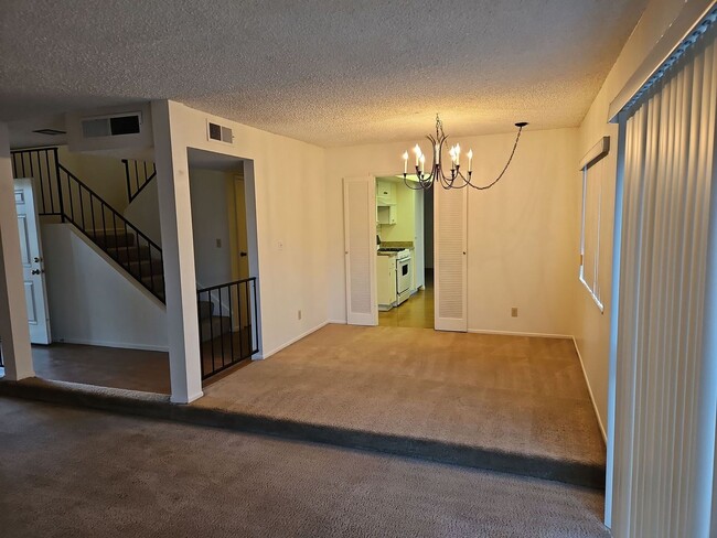 Building Photo - Spacious 4-Bedroom Home with Large Backyard & Covered Patio!