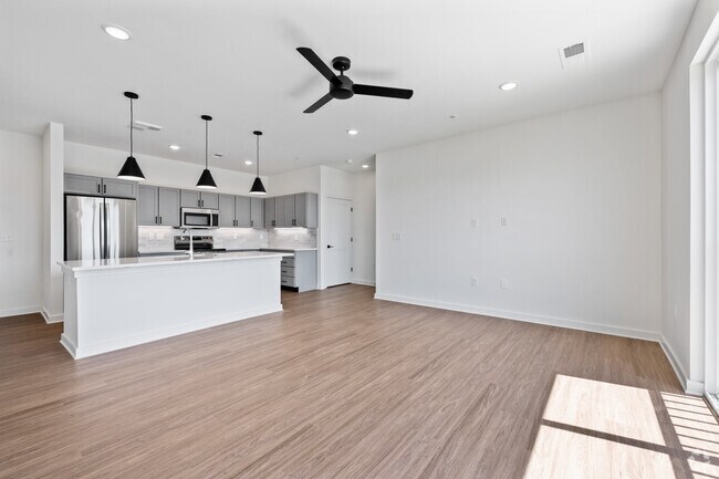 2BR, 2BA - 1,032SF - Living Room - West Row Lofts & Townhomes