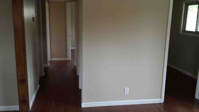 Building Photo - Three bedroom ranch with 2 car garage and large fenced in yard