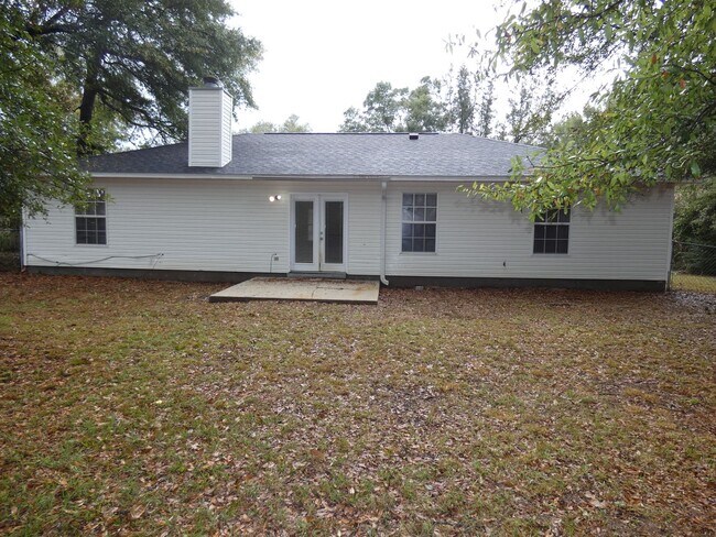 Building Photo - Spacious 3-Bedroom Home — Large Backyard