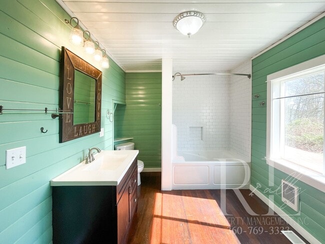 Building Photo - Whimsical Craftsman with Wraparound Porch, Bonus Room & Liberty Bay Peek Views