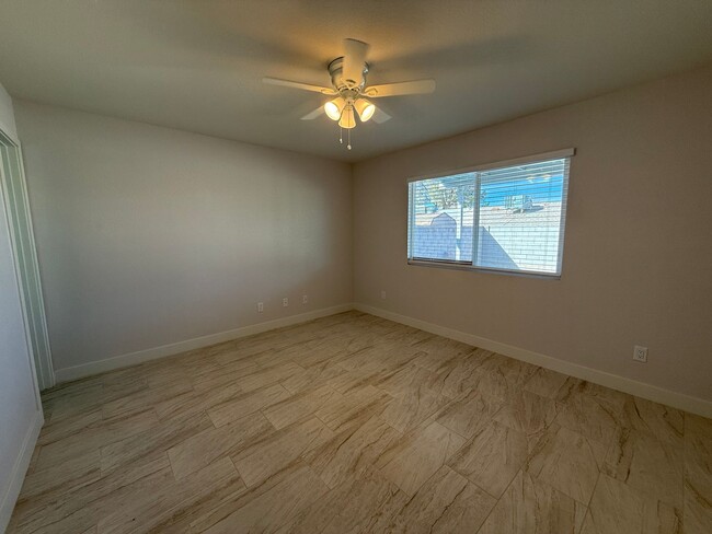 Building Photo - BEAUTIFULLY RENOVATED TOWNHOME! 3BD/2B SIN...