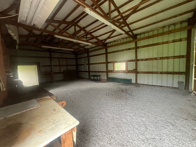 Building Photo - Three bedroom home with XL garage!