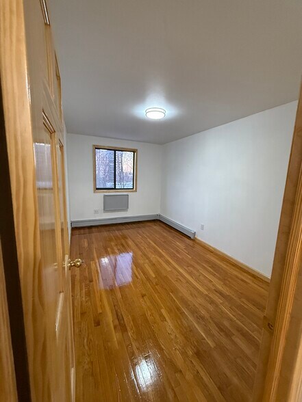 Building Photo - 59-09 48th Ave