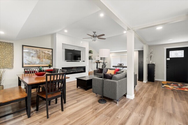 Large dining table, entertainment system with Bose sound system, and standing desk - 4206 N Winnifred St