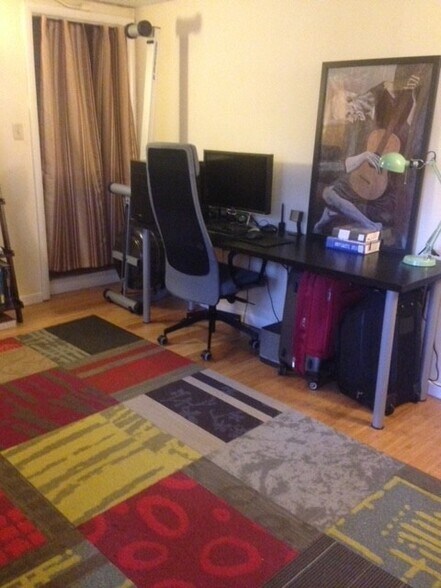 3rd bedroom past kitche, 2 large closets, bath w/ stand up shower, w/d access & back door to house - 213 E Vermilya Ave