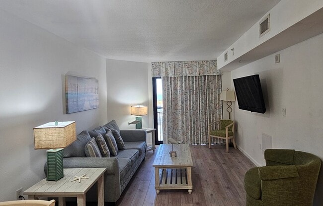 Building Photo - Beach Living at Its Finest – Fully Furnished 1BR/1BA Condo | All Utilities Included