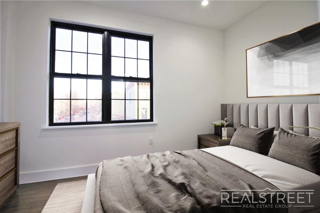 Building Photo - Stunning Brand New 2 BED with W/D in unit!