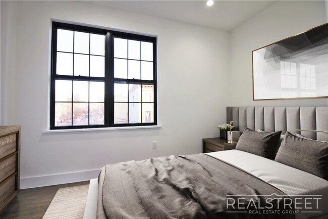 Building Photo - Stunning Brand New 2 BED with W/D in unit!