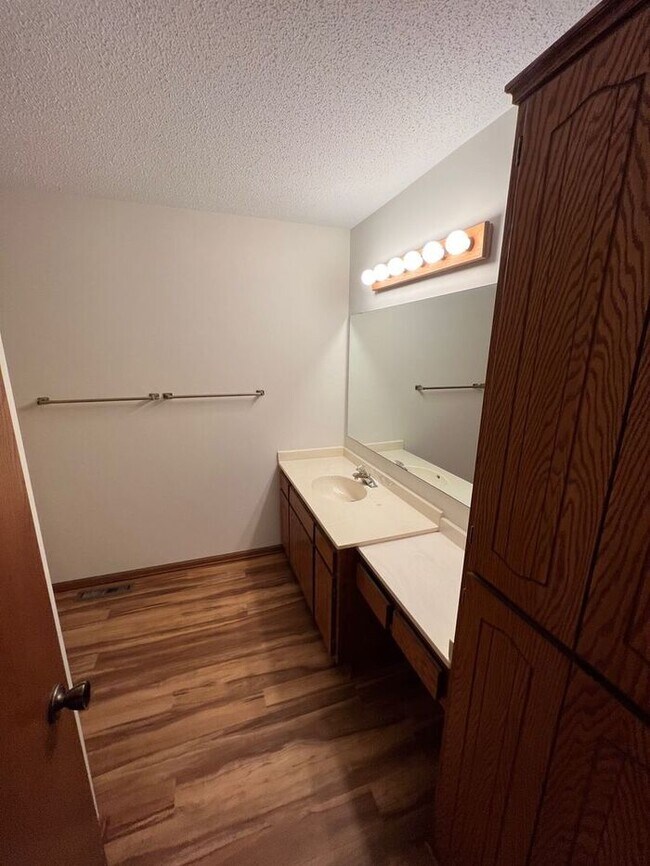 Building Photo - End Unit Single Level Townhouse, New Floor...