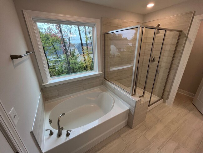 Building Photo - Newly Built 4BD, 3BA Cary Townhome with Modern Amenities and Screened-In Patio