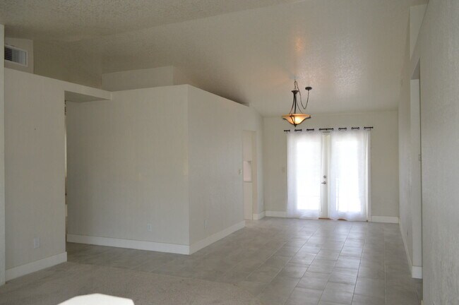 Building Photo - "Charming Oasis: 3-Bedroom Cathedral City Retreat with Pool, Fireplace, and Granite Kitchen!"
