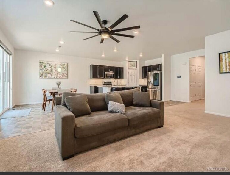 Ranch style great room - 9260 Rifle St
