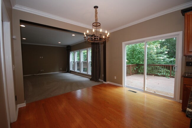 Building Photo - Oversized Executive Style Home with Finish...