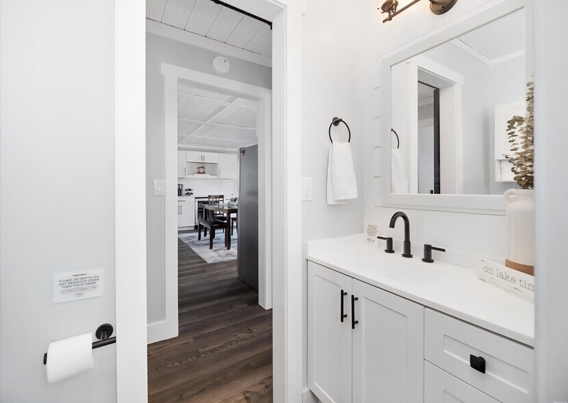 Bathroom by primary bathroom, with a stall shower. - 9202 E Lilac Ln