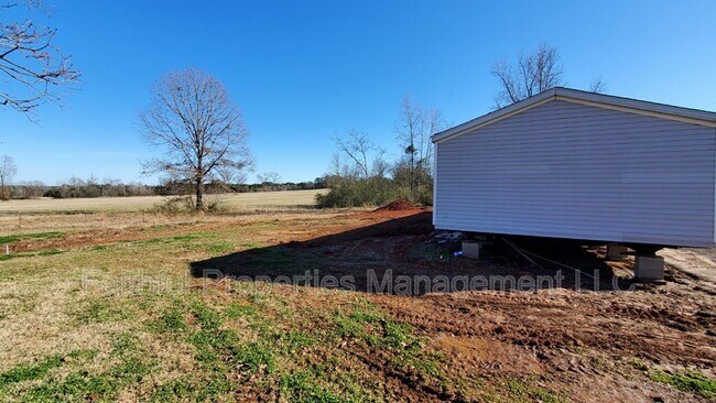 Building Photo - 6397 County Rd 210