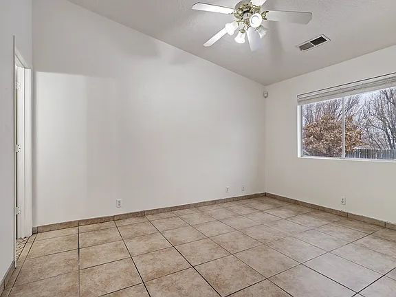 Building Photo - "Spacious 4-Bedroom Gem on Quartz Dr – Your Ideal Albuquerque Retreat!"