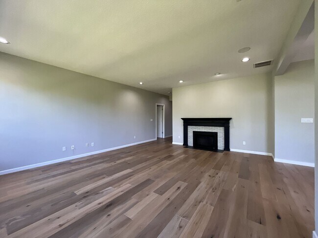 Building Photo - Beautifully Updated 3-Bedroom Bethany Home with Chef's Kitchen, Huge Bonus Room and Private Backyard