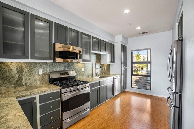 Building Photo - Townhome with EV Ready Garage!