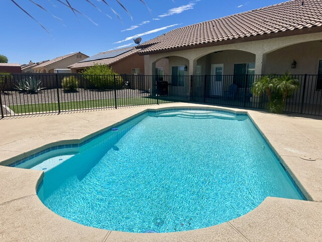 Building Photo - "Gorgeous 4-Bedroom, 2 Bathroom Pool Home ...