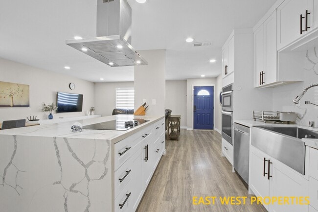 Building Photo - 6942 Santa Rita Ave