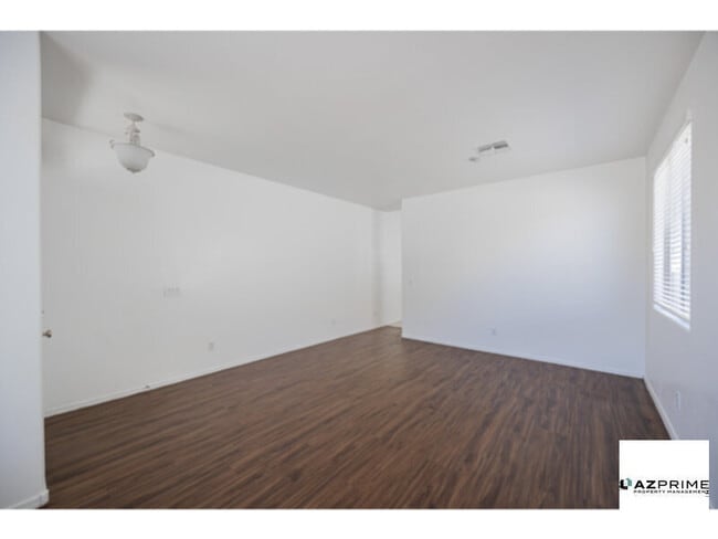 Building Photo - Experience Relaxed Phoenix Living In This Well-Appointed 4/2 Rental That Perfectly Balances Comfort,