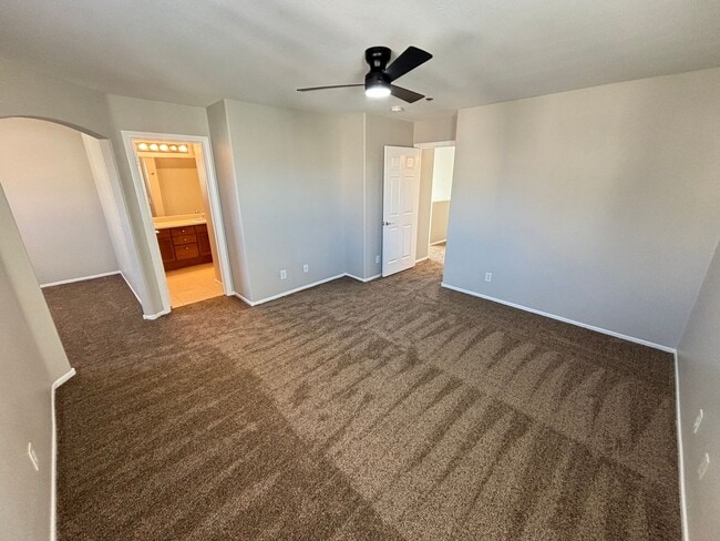 Building Photo - Spacious Tri-Level 4-Bedroom Home with Bal...