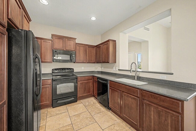 Building Photo - 26616 N Babbling Brook Dr