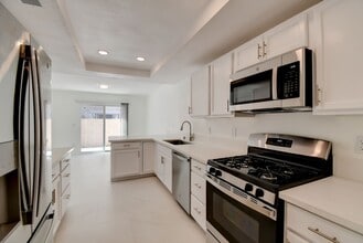 Building Photo - Beautifully renovated two-story home tucked inside a quiet, tree-lined community in the heart of ...