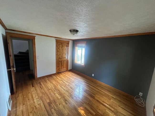 Building Photo - Ideally Located and Updated 4 Bed 2 Bath Fully-Fenced Home w/ Detached Garage/Shop!