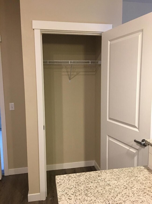 Building Photo - Stunning 1-Bedroom with Upscale Interiors & Open Island Kitchen!